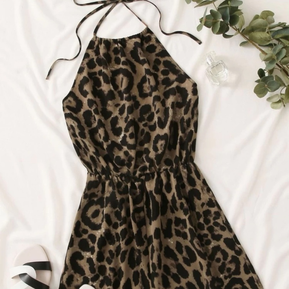 Cheetah print size medium romper.